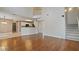 Open-concept living room boasts hardwood floors and easy access to the kitchen area at 5706 Spring Mill Cir, Lithonia, GA 30038