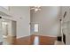 Spacious living room featuring high ceilings, neutral paint, and hardwood flooring at 5706 Spring Mill Cir, Lithonia, GA 30038