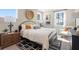 Beautifully staged bedroom featuring natural light, stylish furniture, and modern decor at 1465 Auburn Glen Rd, Dacula, GA 30019