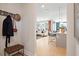 Entryway with a bench, coat rack, and view into the open living space at 1465 Auburn Glen Rd, Dacula, GA 30019