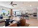 Spacious living room with abundant natural light, open to kitchen and dining area at 1465 Auburn Glen Rd, Dacula, GA 30019