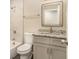 Elegant bathroom with a granite countertop, tiled shower, and modern fixtures at 1643 Pine Glen Cir, Decatur, GA 30035