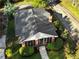 Aerial view of home with new roof and inviting screened-in porch perfect for relaxing at 2791 Pearl St, East Point, GA 30344
