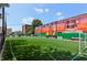 A vibrant community space with an eye-catching mural and sports field for recreation at 2791 Pearl St, East Point, GA 30344