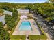 Beautiful community pool surrounded by trees, shrubbery, parking and meticulously kept landscaping at 6700 Roswell Rd # 15B, Atlanta, GA 30328