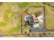 Aerial view of a home with large lot featuring a swimming pool and landscaping at 714 Billings Farm Ln, Canton, GA 30115
