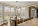 Breakfast nook with lots of windows and a view to the outside at 714 Billings Farm Ln, Canton, GA 30115