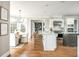 Elegant kitchen showcasing a center island, stainless steel appliances, and an adjacent breakfast nook at 714 Billings Farm Ln, Canton, GA 30115