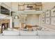 Spacious living room with a fireplace, built-in bookshelves, comfortable seating, and an overhead view at 714 Billings Farm Ln, Canton, GA 30115