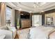 Elegant main bedroom boasts large windows, designer touches, and a sitting area at 714 Billings Farm Ln, Canton, GA 30115
