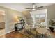 Bright office space with hardwood floors, stylish rug, and natural light at 714 Billings Farm Ln, Canton, GA 30115