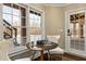 Cozy sitting area with natural light and views; ideal spot to relax and entertain at 714 Billings Farm Ln, Canton, GA 30115