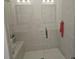 Modern bathroom with a glass-enclosed shower, contemporary tile, and a built-in bench at 1309 Bennett Creek Ovlk, Suwanee, GA 30024