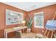 Bright home office featuring stylish decor, a large window, and a functional workspace for a productive environment at 208 Village Overlook # J3, Canton, GA 30114