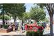 Town square featuring a small crowd with vintage tractors on display for the public to view at 208 Village Overlook # J3, Canton, GA 30114
