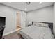 Modern bedroom featuring a TV, neutral colors, and wood-look floors at 2995 Barimore, Dacula, GA 30019