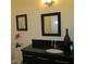 Chic bathroom featuring a modern vanity, sleek mirror, and decorative accents at 333 Nelson Sw St # 214, Atlanta, GA 30313