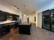 Modern kitchen featuring stainless steel appliances, a large island, and dark cabinetry at 333 Nelson Sw St # 214, Atlanta, GA 30313