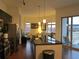 Open kitchen featuring stainless steel appliances, a large island, and an adjacent living space at 333 Nelson Sw St # 214, Atlanta, GA 30313
