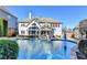 Beautiful backyard features an in-ground pool and outdoor seating area, perfect for entertaining at 3350 Vista Creek Dr, Dacula, GA 30019