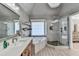 Spa-like bathroom with walk-in shower, soaker tub, and dual sink vanity at 3350 Vista Creek Dr, Dacula, GA 30019