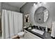 Bathroom featuring a shower, granite counters and modern fixtures at 3350 Vista Creek Dr, Dacula, GA 30019
