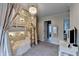 Bedroom featuring cozy bunk beds with soft, decorative curtains, and a vanity at 3350 Vista Creek Dr, Dacula, GA 30019