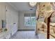 Bedroom featuring cozy bunk beds with soft, decorative curtains, large closet, and a vanity at 3350 Vista Creek Dr, Dacula, GA 30019