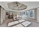 Bright main bedroom features tray ceilings, neutral tones, and large windows with natural light at 3350 Vista Creek Dr, Dacula, GA 30019