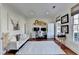 Bright and inviting home office with hardwood floors, white furniture, and natural light at 3350 Vista Creek Dr, Dacula, GA 30019