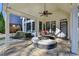 Charming covered patio featuring comfortable seating, offering an ideal space for outdoor relaxation and entertaining at 3350 Vista Creek Dr, Dacula, GA 30019