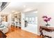 Bright sitting area with hardwood floors, built-in shelves and access to a covered deck at 1511 Womack Rd, Atlanta, GA 30338