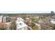 Panoramic aerial showing the property and neighborhood, surrounded by mature trees and manicured landscapes at 2233 Peachtree Ne Rd # 1202, Atlanta, GA 30309