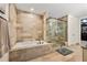 Luxurious bathroom features a soaking tub and glass enclosed shower at 2233 Peachtree Ne Rd # 1202, Atlanta, GA 30309