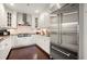 A well-lit kitchen with stainless steel appliances, white cabinets, and granite countertops at 2233 Peachtree Ne Rd # 1202, Atlanta, GA 30309