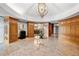 Elegant lobby with wood paneled walls, decorative lighting, and tile flooring at 2233 Peachtree Ne Rd # 1202, Atlanta, GA 30309