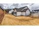 A spacious backyard with a black iron fence, and lots of room for activities at 4750 Fields Bridge Rd, Cumming, GA 30028