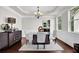 A formal dining room with decorative lighting, a large sideboard and decor at 48 Scenic Ovlk, Acworth, GA 30101