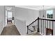 Second story hallway with decorative banister and door to room at 48 Scenic Ovlk, Acworth, GA 30101
