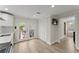 Bright kitchen with white cabinets, stainless appliances, and French doors leading to the outdoors at 1164 Sandtown Sw Rd, Marietta, GA 30008