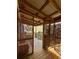 View of wood deck covered patio featuring rustic privacy and wooden beams at 1395 W Booth Road Sw Ext, Marietta, GA 30008