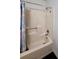 Shower and bath combination with blue curtain, and modern fixtures at 1395 W Booth Road Sw Ext, Marietta, GA 30008