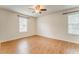 Bedroom with neutral walls, wood laminate flooring, and ample natural light at 60 Kyler Way Way, Dallas, GA 30157