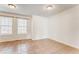 Bedroom with tile flooring, two windows, and white walls creating a serene atmosphere at 60 Kyler Way Way, Dallas, GA 30157