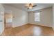 Spacious bedroom showcasing wood laminate flooring and neutral paint at 60 Kyler Way Way, Dallas, GA 30157