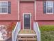 Charming front entry with wood stairs, and colorful foliage at 60 Kyler Way Way, Dallas, GA 30157