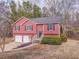 Traditional home featuring a two-car garage, front door and landscaping at 60 Kyler Way Way, Dallas, GA 30157