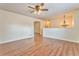 Spacious living room with modern ceiling fan and wood laminate flooring at 60 Kyler Way Way, Dallas, GA 30157