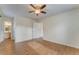 Large main bedroom with wood laminate floors and adjoining bathroom at 60 Kyler Way Way, Dallas, GA 30157