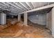 Unfinished basement with water heater, exposed pipes, and cinder block walls at 1981 Lindsey Ln, Decatur, GA 30035